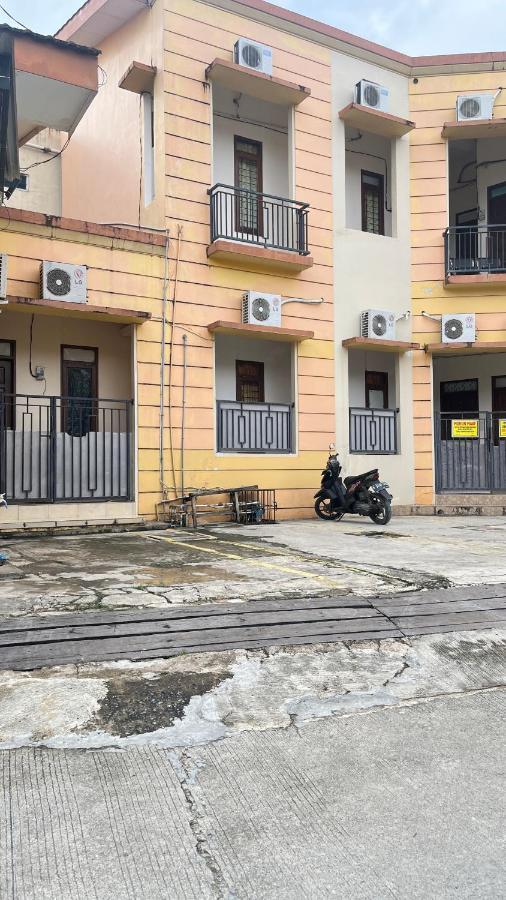 Oyo 93380 Penginapan Mangkoe Barokah Tanah Grogot Luaran gambar